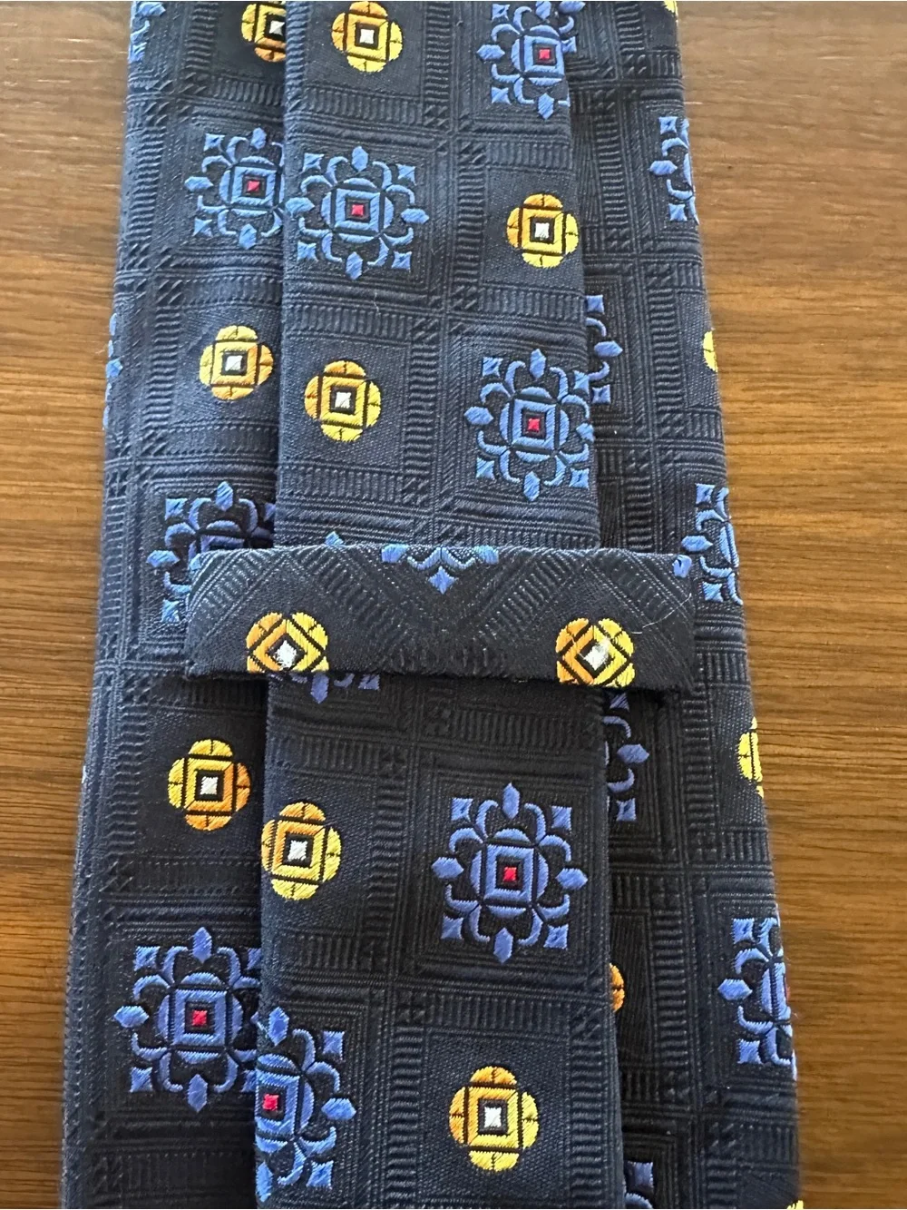 Holland & Sherry Classic Navy Silk Tie with Blue and Yellow Medallion Pattern